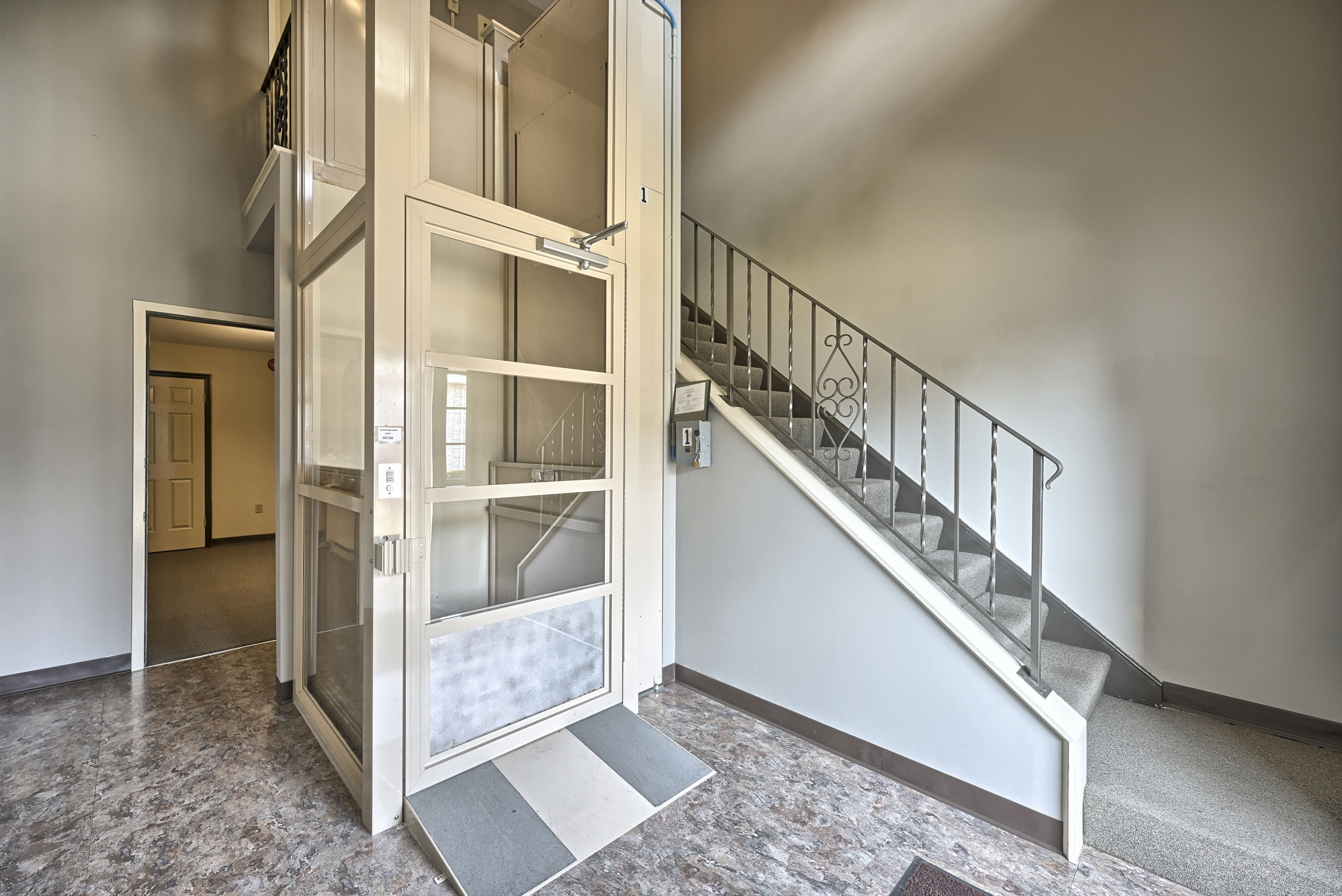 Elevator access to second-floor apartments