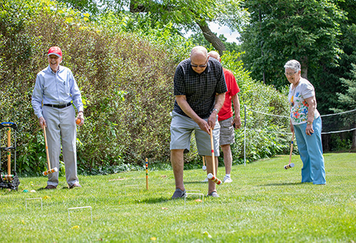 Residents playing a game outdoors